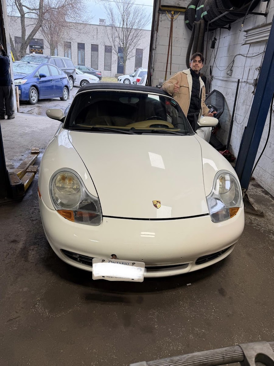 Umar at The Car Doctor with a customer vehicle on Sherry Road
